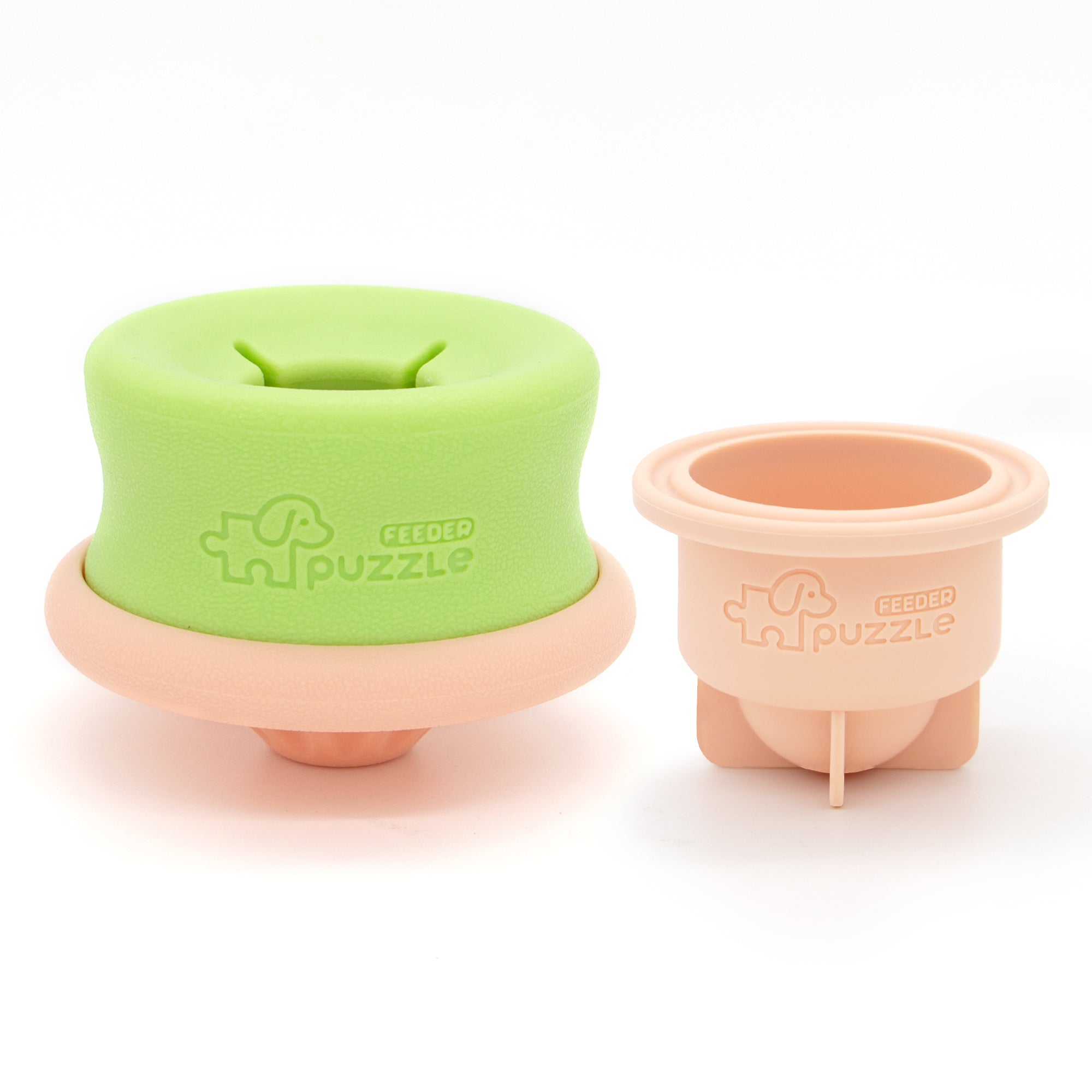 Two interactive PuzzleFeeder™ Lickpop Pink dog toys—one large with a soft top, one small with a solid rim—feature slow feeding, treat dispensing, and freezable pink designs for fun enrichment.