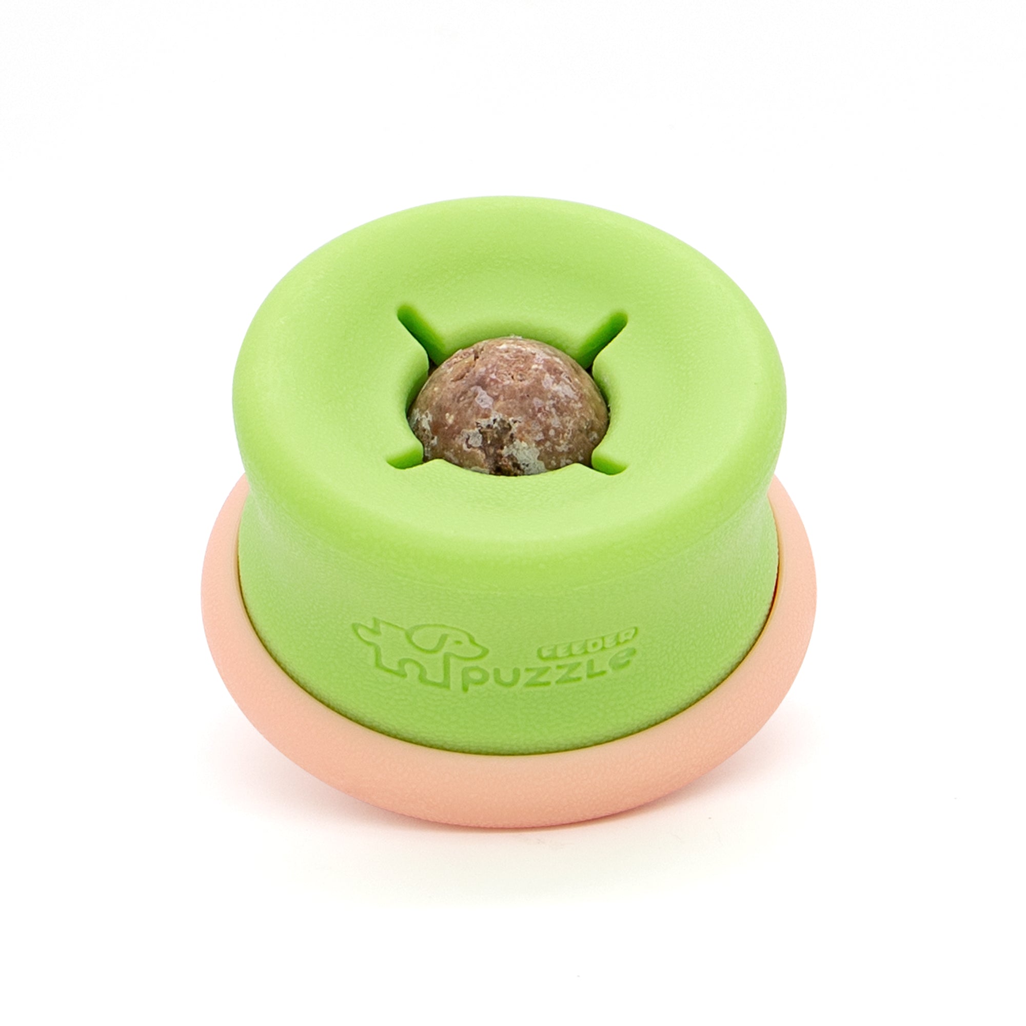 The PuzzleFeeder™ Puzzle Lickpop Pink is an interactive, pink circular dog toy designed for slow feeding and treat dispensing, with a freezable feature to keep your pup busy.