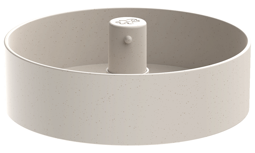 Beige, circular puzzle dog feeder with a rotating mechanism, central post, and dog paw print design on top to help slow down feeding times.