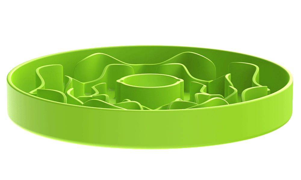 Green circular slow feeder dog bowl designed with a grooved maze-like pattern inside to slow down eating and provide a puzzle-like challenge.