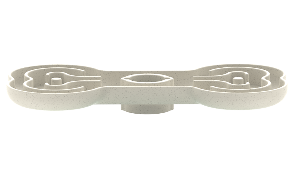 A white, bone-shaped slow feeder dog bowl featuring a textured surface and puzzle-like maze compartments to slow down eating.