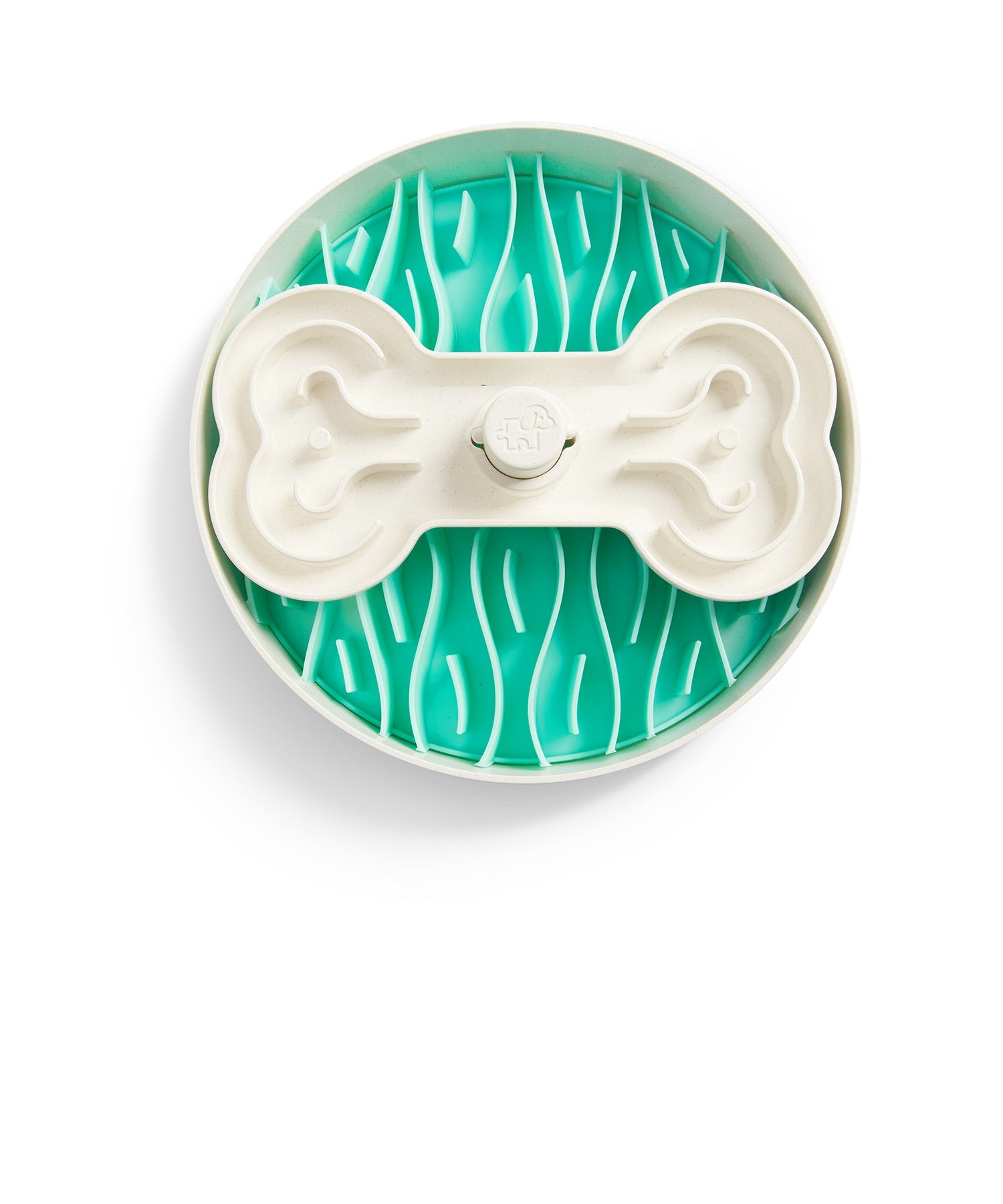 A white circular ceiling fan with green blades spinning against a cream-colored background.